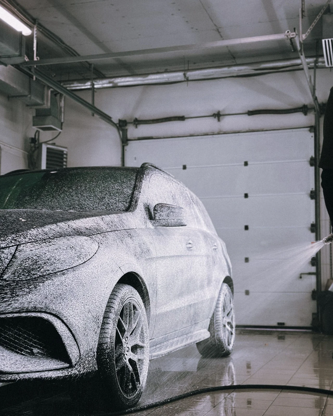 Luxury car receiving a careful wash